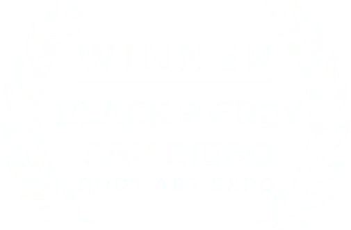 Winner accolade for Black & Grey tattoo competition at the San Diego Body Art Expo, surrounded by laurel wreaths.