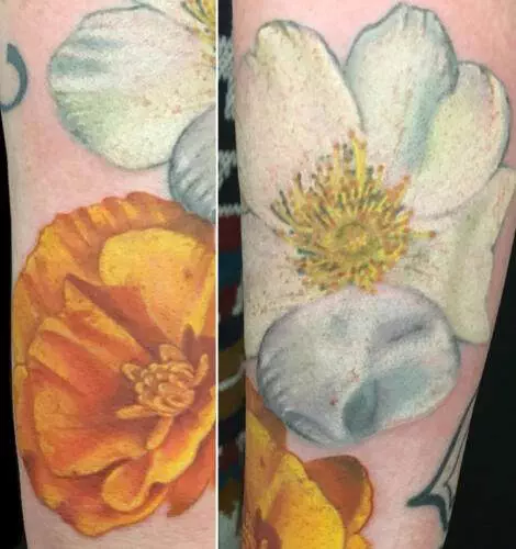 Close-up of a tattoo featuring a vibrant yellow flower on the left and a white flower with a green center on the right.