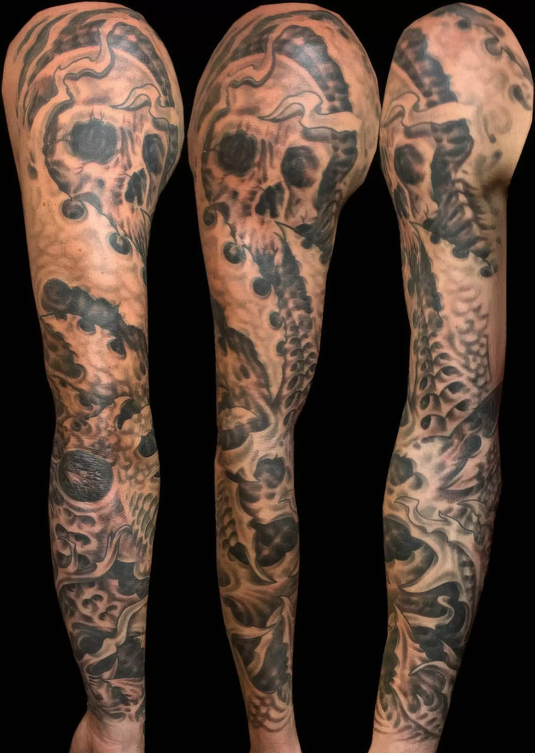 Three images showing a detailed full sleeve tattoo on an arm, featuring skulls, abstract patterns, and textured shading. The arm is displayed from different angles to showcase the entire design.